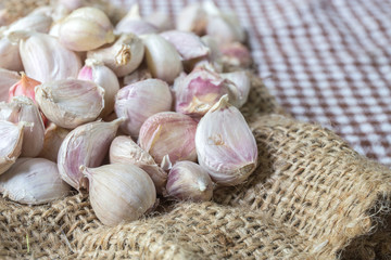 Burlap sack with garlic