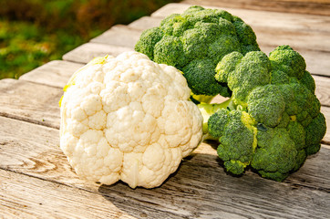 Broccoli cabbage in the garden on a wooden table.