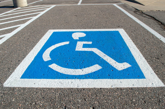Empty parking spot with handicapped parking symbol