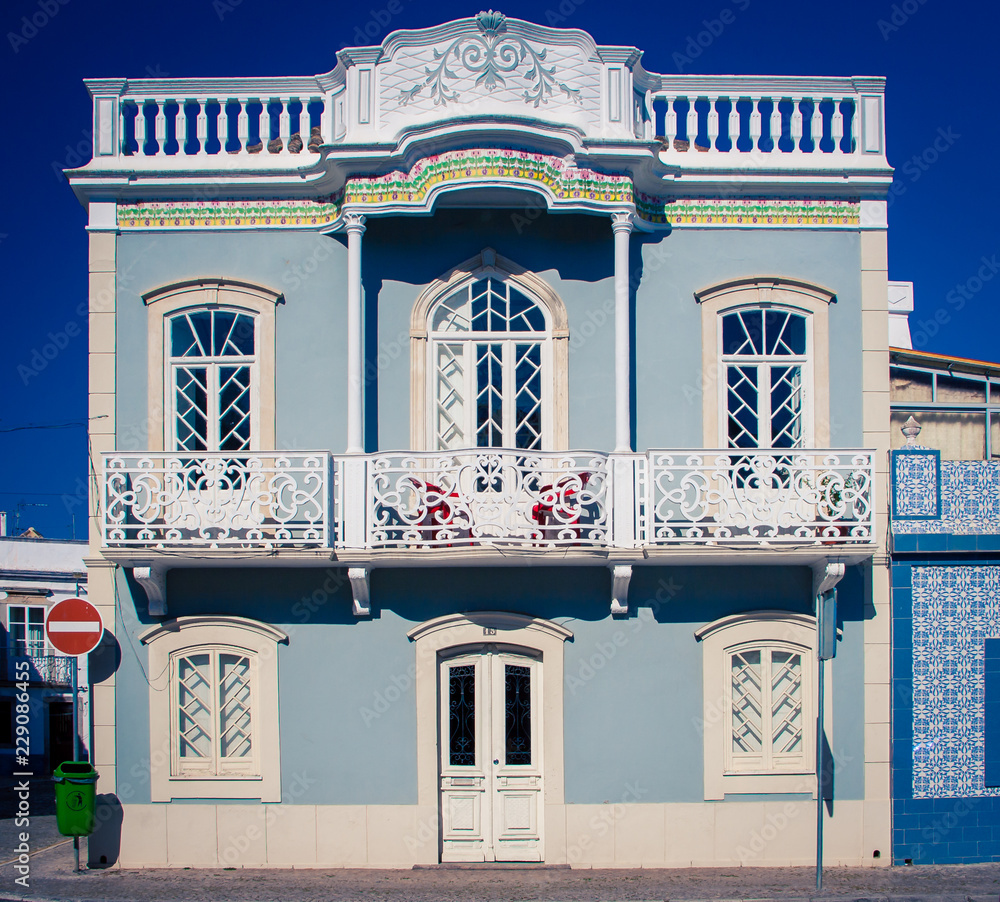 Wall mural balcony on a building in portugal