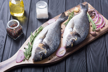 Raw dorado fish and ingridient for cooking