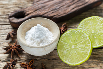 Baking soda and lemon on the table