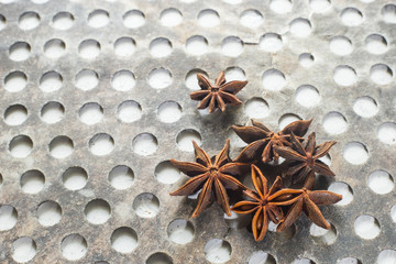 star anise on perforated steel