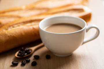 Cup of coffee and baguette french bread