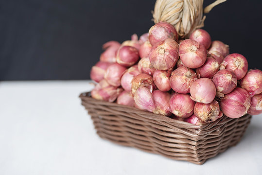 Red shallot onion in a basket, herb and spice, food ingredient