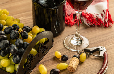 wine table with cheese and grapes
