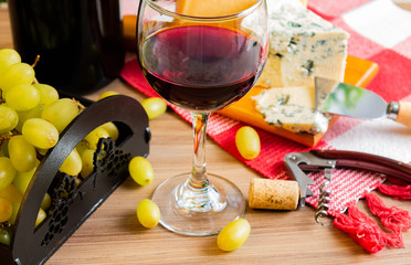 wine table with cheese and grapes