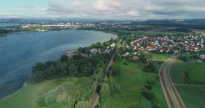 Aerial view Lake Constance with pan to the left from Radolfzell to the island Mettnau and Reichenau 4K