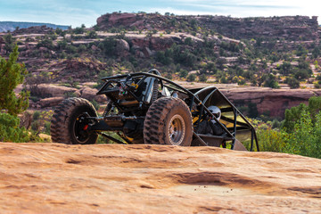 A Custom 4x4 Rock Crawler Off-Roading In The Sandstone Red Rock Terrain Outside Of Moab Utah In The American Southwest © SIX60SIX