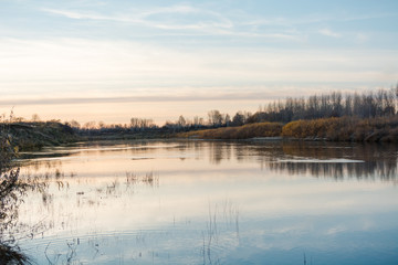 River in the fall. Gray weather in the fall.