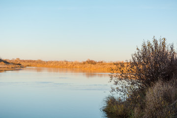 River in the fall. Gray weather in the fall.