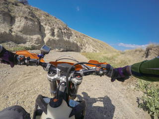 Enduro journey with dirt bike in high mountains in Caucasus nature