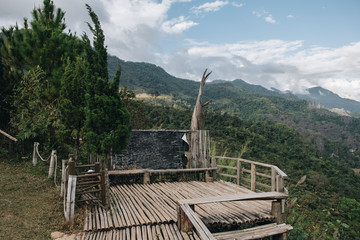 the wooden observation deck on the peak of mountain to view the scenic point of Phu Lanka, Payao province, North of Thailand