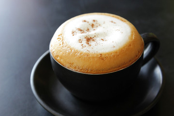 cup of hot cappuccino coffee