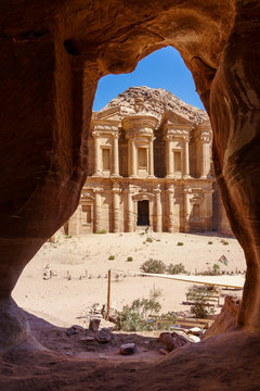Stunning view from a cave of the Ad Deir - Monastery in the ancient city of Petra, Jordan, Incredible UNESCO World Heritage Site.