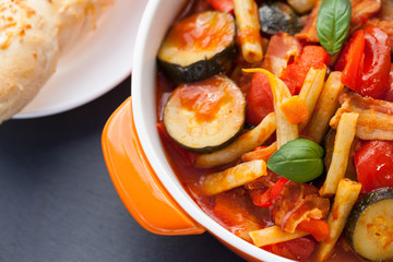 ratatouille with red pepper, tomatoes and green beans.