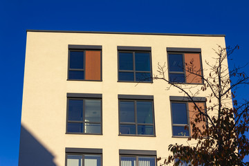 modern office facades under blue sky