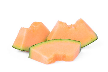 sliced japanese melons, orange melon or cantaloupe melon with seeds isolated on white background