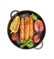 Grilled sausages for grilling in a pan. Isolated on white background.