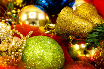 Christmas colorful balls and golden bell.
