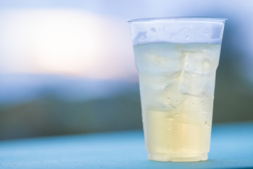 The background of ice cold water and soft drinks (soft drinks, beer, liqueurs, drinking water) has the vapor dispersed around the glass, a beautiful one, the colorful wallpapers of bubbles.