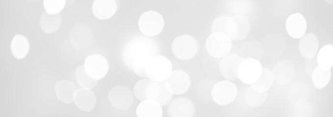 Elegant Abstract Silver Christmas Background with white bokeh lights for Holiday Poster, Banner,...