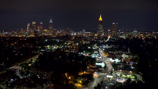 Atlanta Aerial v476 Cityscape hyperlapse moving away from downtown along street route with traffic 9/18