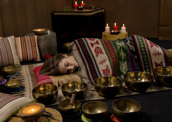 meditation with Tibetan singing bowls. Concept of calmness and relax