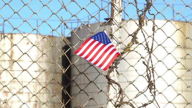 American Flag on Barbed Wire Fence 4K