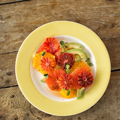 plate summer fruit salad wooden background top view