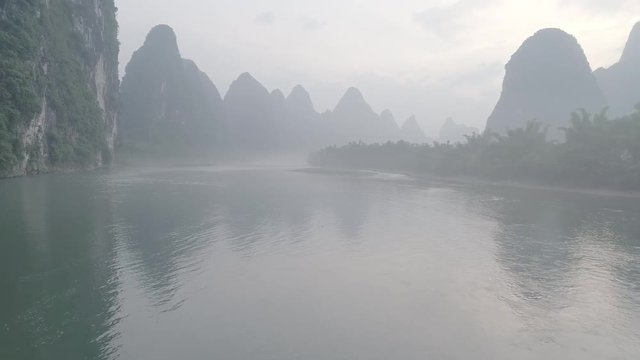 Li River and Karst mountains in mist