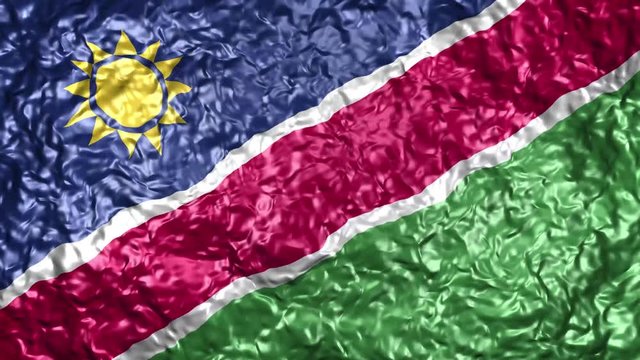Video of realistic wavy Namibia flag with seamless loops of waving background 