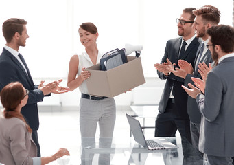 business team applauds the new employee
