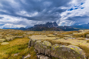 Fototapeta premium Beautiful cloudscape and rain clouds in the Dolomite Alps in summer