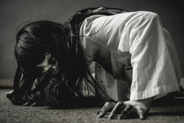 Halloween or horror concept, Women dressed in costume cosplay horror zombies or ghost on Halloween festival.