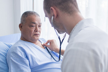 Healthcare and checking pressure, doctor use stethoscope for measurement of old patient