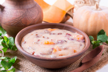 Pumpkin porridge in a plate, horizontal