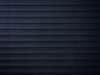 Rough surface row on black background of seat decoration. Line pattern wallpaper.