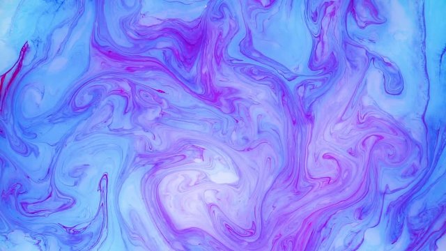 Abstract paint ink in motion. Psychedelic background footage. Colorful spots.