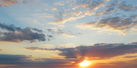 Panoramic view of beautiful orange sunset background