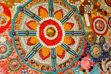 Lovely colorful mosaic designs made with pottery shards and glass gems, at Pha Sorn Kaew, in Khao Kor, Phetchabun, Thailand.