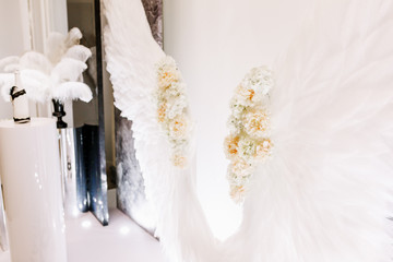 white feather wings - wedding photozone background