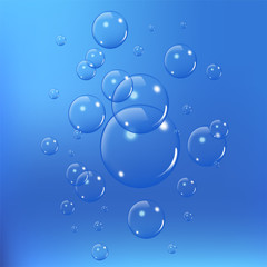 Realistic soap bubbles set isolated on the blue background. vector Illustration