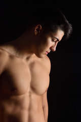 Fototapeta premium portrait of a man without clothes black background