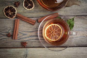 aromatic hot cinnamon tea on wooden table
