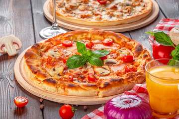 Delicious fresh pizza served on wooden table