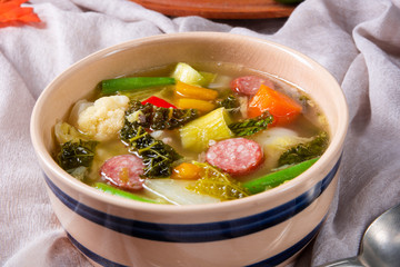 delicious autumnal vegetable soup with sausage and bacon