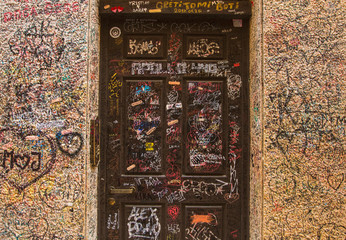 Graffiti and filthiness on a wall in Verona in the near of the famous Romeo & Juliett balcony