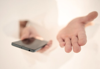 close up. a new smartphone in the hands of a businessman