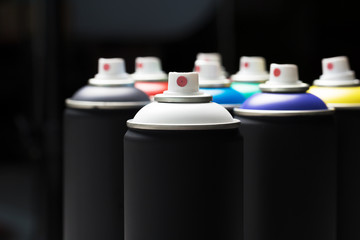 Spray paint cans close up